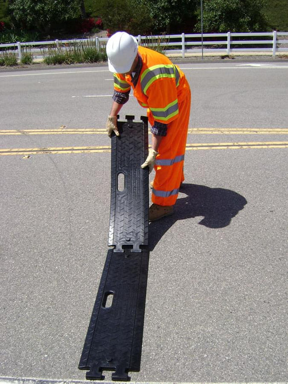 Three (3) TrafFix Alert Rumble Strips cover a standard width lane